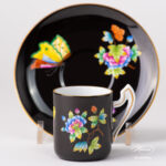 Herend Victoria Black coffee set octagonal VE-FN. Black background with Victoria butterflies and peonies.