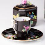Herend Victoria Black coffee set octagonal VE-FN. Black background with Victoria butterflies and peonies.