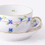 Herend Blue Garland tea cup with saucer. Closeup.